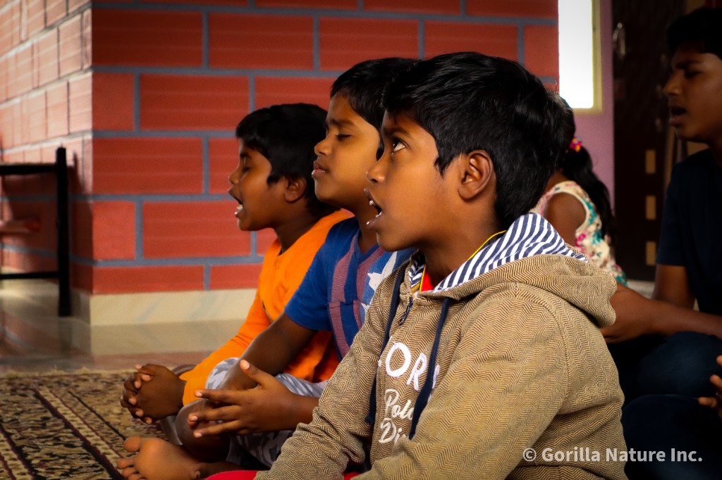 Children singing together in India